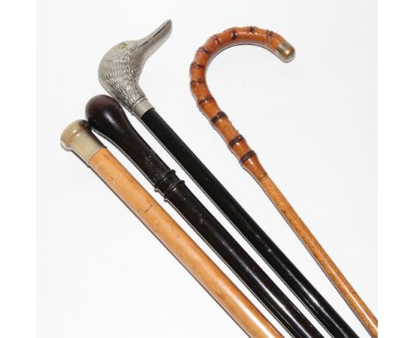 Duck head walking stick and 3 others