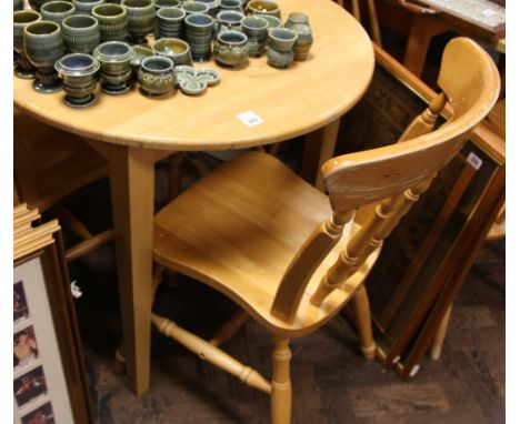 Oval light beech kitchen/dining table and 4 matching Windsor style chairs