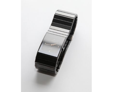 Ladies titanium and black ceramic Rado Jubilee Quartz wristwatch with diamond dot quarterly markers.  With box and papers. 