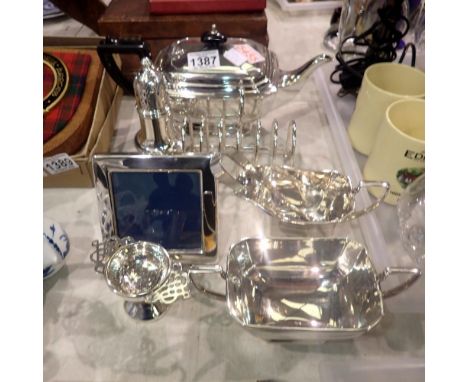 Collection of silver plated items including a tea service, sugar caster and toast rack. Not available for in-house P&amp;P
