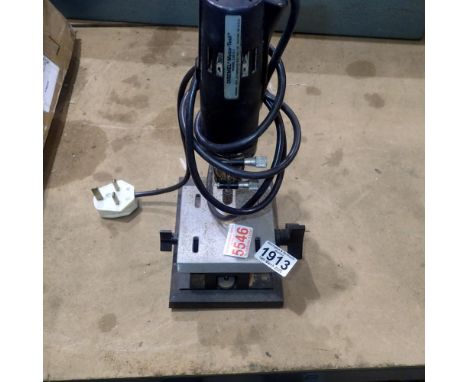 Dremel Mini Moto drill press, model 21G. All electrical items in this lot have been PAT tested for safety and have passed. Th
