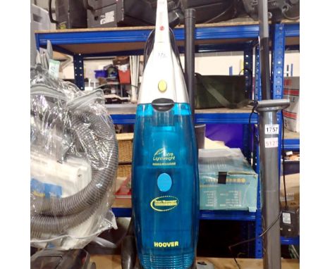 Hoover 2000w, bag less upright vacuum cleaner. All electrical items in this lot have been PAT tested for safety and have pass