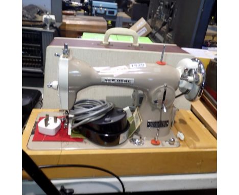 Cased new Home, electric sewing machine. All electrical items in this lot have been PAT tested for safety and have passed. Th