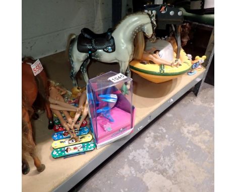 Shelf of toys to include Action Man, Barbie and Dougle. Not available for in-house P&amp;P