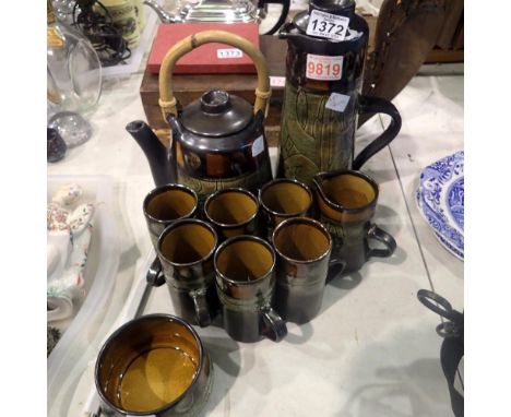 Ten piece Celtic studio pottery set, coffee jug, tea pot, cream/sugar and six mugs. Not available for in-house P&amp;P
