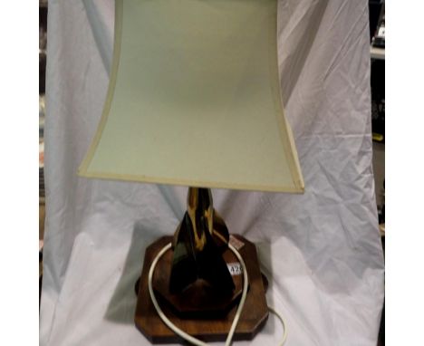 Wooden based brass propeller lamp. All electrical items in this lot have been PAT tested for safety and have passed. This doe