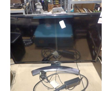 LG 24 inch TV working and with remote. All electrical items in this lot have been PAT tested for safety and have passed. This