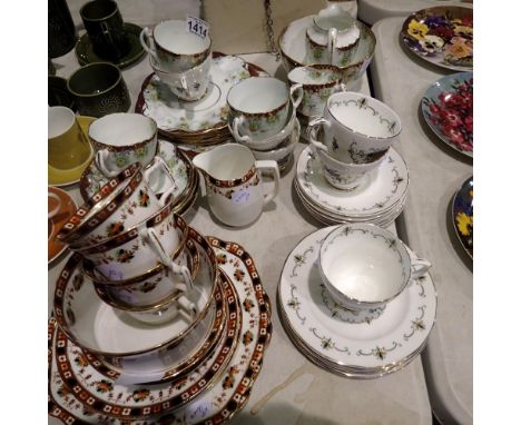 Eighteen piece vintage China tea set, a twenty one piece vintage tea set and a sixteen piece tea set. Not available for in-ho