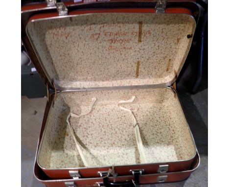 Two red locking vintage suitcases. Not available for in-house P&amp;P 