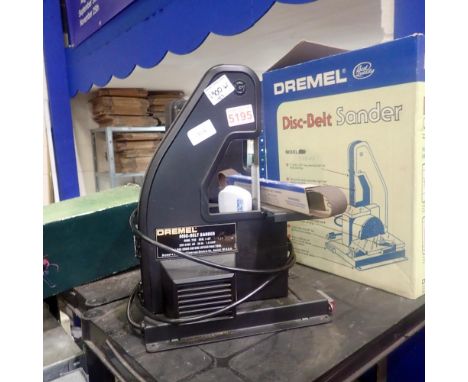 Dremel disc belt sander, model 738. Oak dining table and six chairs. All electrical items in this lot have been PAT tested fo