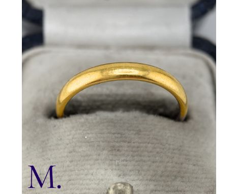A 22ct Gold BandThe band is hallmarked for 22ct gold and is dated 1933.Weight: 3.4gDate: M 