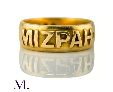 An Antique Mizpah RingThe 18ct yellow gold band has the word 'mizpah' embossed to the front.Weight: 5.7gSize: K 