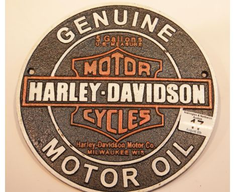 Cast iron Harley Davidson Motor Oil sign, D: 24 cm. P&amp;P Group 2 (£18+VAT for the first lot and £2+VAT for subsequent lots