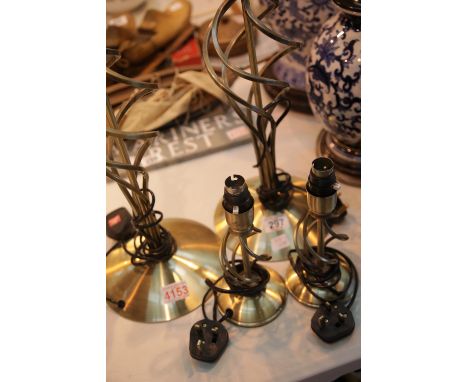 Two large and two small spiral design brass coloured table lamps. This lot is not available for in-house P&PCondition Report: