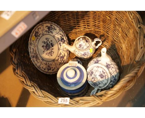Vintage cane basket containing blue and white ceramics. This lot is not available for in-house P&amp;P 