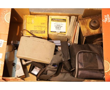 Box of vintage photographic items to include boxed developing tanks, Polaroid etc. This lot is not available for in-house P&a