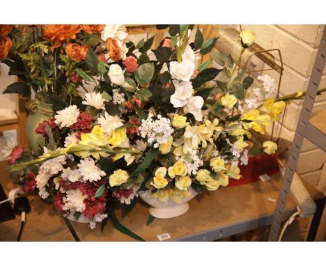 Four ceramic pots of faux flowers. This lot is not available for in-house P&amp;P. 