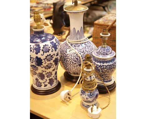 Four blue and white Oriental type table lamps. This lot is not available for in-house P&PCondition Report: All electrical ite