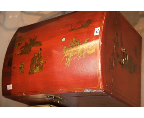 Red lacquered Oriental type dome top trunk. This lot is not available for in-house P&amp;P 