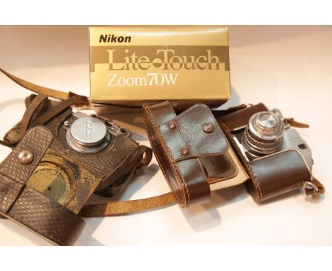Two vintage 35mm cameras with a Nikon Lite Touch. P&amp;P Group 2 (£18+VAT for the first lot and £2+VAT for subsequent lots) 