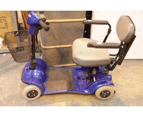 Kymco disability scooter with manual, charger and ket (untested). This lot is not available for in-house P&amp;P 