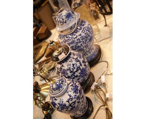 Three Oriental type blue and white table lamps of various designs. This lot is not available for in-house P&PCondition Report