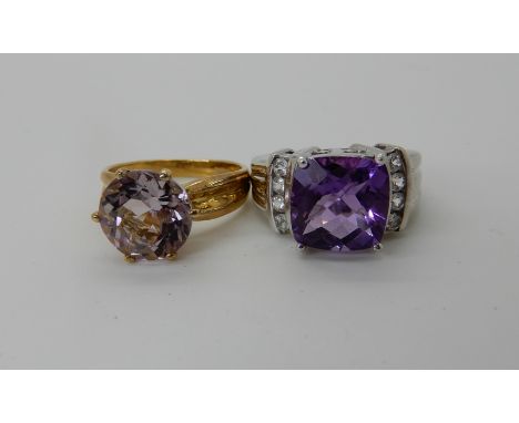 A 9ct yellow gold amethyst ring size N1/2, a 9ct white gold amethyst and clear gem set ring size N1/2, weight for both 11gms 