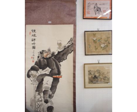 A Chinese scroll painting of a man with sword toasting his glass, 136.5cm high x 67cm wide (painting only) and three framed C