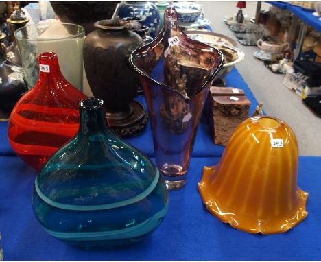Two contemporary studio glass vase, one in red, the other turquoise, 34cm high, another amethyst glass vase, 44.5cm high and 