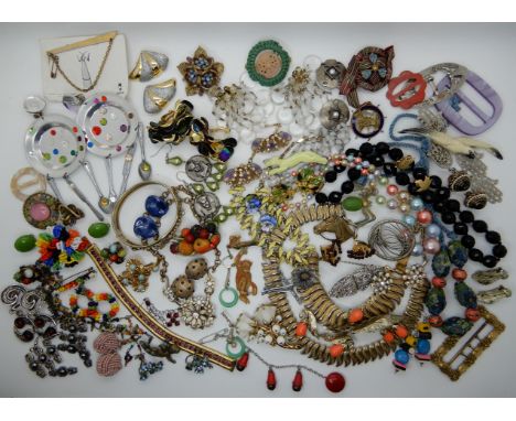 A collection of vintage costume jewellery to include, an orange fruit brooch and earrings by Sarah Coventry, knife fork and s