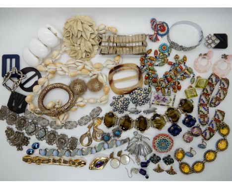 A collection of vintage costume jewellery to include, carved Lucite items, snake bangle etc Condition Report: Not available f