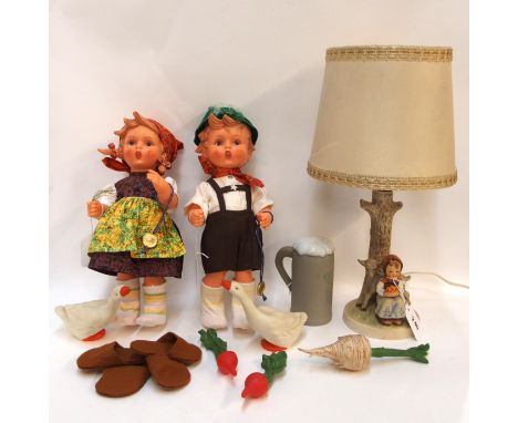 A Hummel 'Good Friends' table lamp, no. 228, 37cm high including shade, and two Hummel vinyl dolls with accessories including
