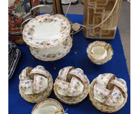 George Warrilow &amp; Sons Ltd Queens China teaset, comprising; twelve cups, saucers and plates, milk jug, sugar bowl and two
