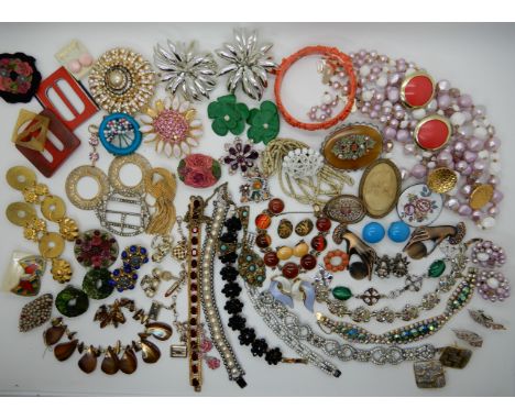 A collection of vintage costume jewellery to include, early coral plastic flower bangle, bracelets etc Condition Report: Not 