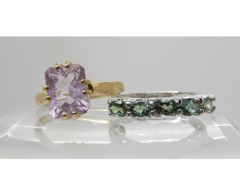 A 9ct amethyst ring size N1/2 and a 9ct white gold five stone green gem ring size N1/2, combined weight 5.2gms Condition Repo