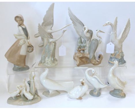 Seven Nao figures and one Lladro figure of birds including cranes, ducks, geese etc and a Nao figure of a girl with a basket 