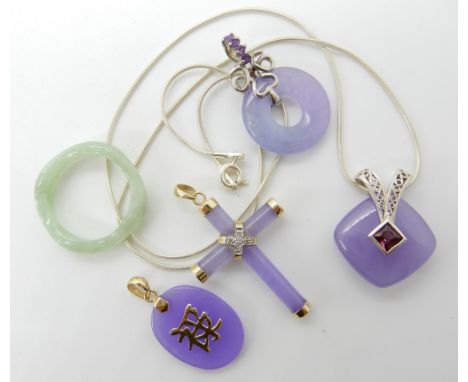 A 14k gold and diamond set lilac jade set cross pendant, a 14k mounted lilac jade Chinese symbol pendant and further hardston