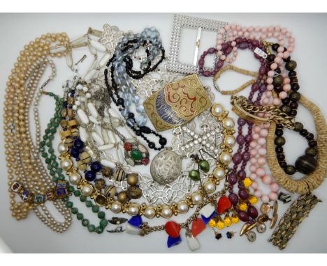 A collection of vintage costume jewellery to include, glass cameo earrings, a large Deco buckle, cufflinks etc Condition Repo