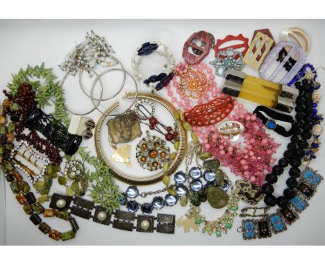 A collection of vintage costume jewellery to include, enamelled bracelet, Iona marble beads, large Lucite buckle Condition Re