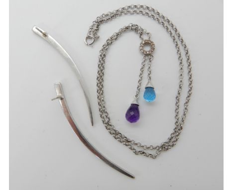 A 9ct gold diamond, amethyst and blue topaz pendant necklace, length 41cm and a pair of 9ct gold tusk shaped earrings length 