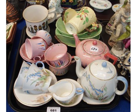 A Shelley china tea for two decorated with bluebells, comprising; teapot, 14cm high, two cups and saucers, milk jug, sugar bo