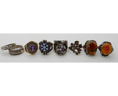 An early Ola Gorie silver ring, two retro millefiori glass set rings and five other vintage rings Condition Report: Not avail