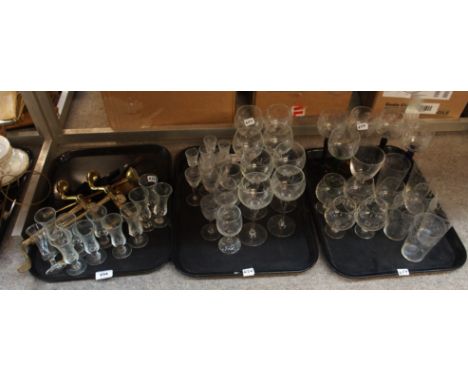 A pair of brass fire dogs and fireside tools, various drinking glasses etc Condition Report: Available upon request