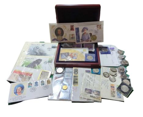 A quantity of GB commemorative coins, some coin covers and other similar items