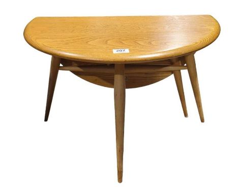 An Ercol light elm circular coffee table with one side folding down, 61cms diam 40cms high