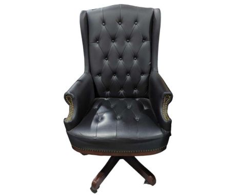 A modern button black leather adjustable swivel chair