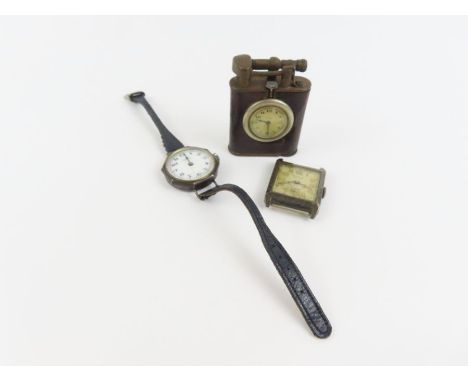 A silver cased Bravingtons Renown watch face; an Elem lighter clock and a Corma watch 