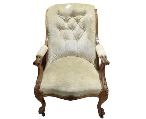 A Victorian walnut framed button back chair