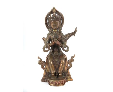 Buddha MaitreyaNepal, 1. Hälfte 20. Jh., Bronze, mit türkisen Steinen besetzt, zweiteilig mit gestecktem Attribut, Bodenplatt