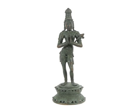 Devi ParvatiIndien, 19./20. Jh., Bronze, Reste einer grünen Patina, auf einem Lotussockel stehend, H: ca. 34,5 cm. Provenienz